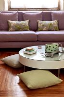 Round coffee table and floor cushions