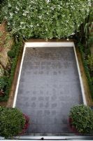 Elevated view of walled patio garden