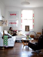 Woman relaxing in modern living room