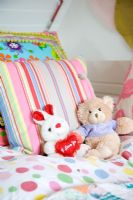 Toys on childs bed