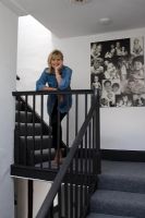 Lena Proudlock on stairs