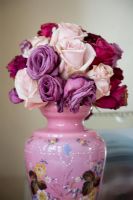 Vintage roses in colourful vase