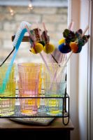 Colourful glassware and decorative straws 
