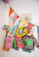 Clothes and toys in modern childrens room 