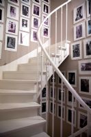 Display of photographs on ornamental staircase