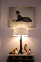 Painting and display of shoes with lamp