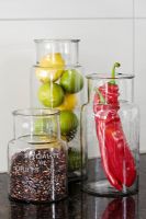 Glass storage jars on kitchen worktop