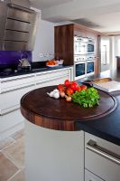 Contemporary kitchen with integrated chopping board