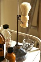 Shaving accessories on stand