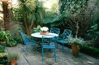Blue garden furniture on terrace 