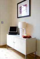 Contemporary cabinet with laptop