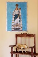 Religious painting and golden pig ornament