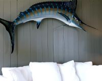Sword fish above sofa