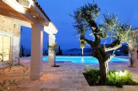 Luxury villa garden at night