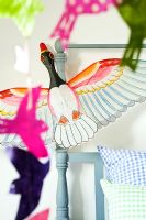 Detail of bird mobile in childrens room 