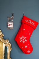 Christmas stocking on grey wall