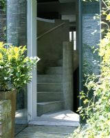 View through patio door to spiral staircase