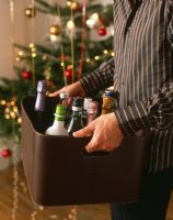 Man carrying box of alcohol at Christmas 