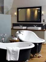 Modern bathroom with twin baths
