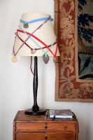 Ribbons around modern lampshade 