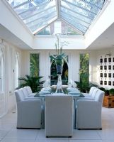 Dining table in modern conservatory 