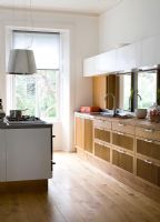 Wooden units in modern kitchen 
