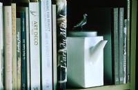 Detail of teapot on bookshelf 