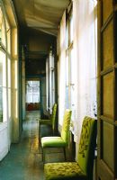 Chairs in long corridor 