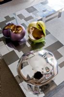 Decorative bowls on modern coffee table 