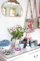 Flowers and accessories on cabinet