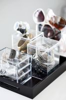Display of jewellery boxes and sunglasses 