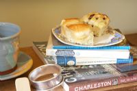 Detail of scones and books on table 