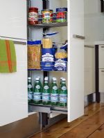 Slide out cupboard in modern kitchen 