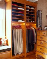Wardrobe and shelves in classic bedroom 