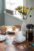 Breakfast accessories on dining table 