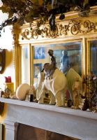 Display of collectibles on mantelpiece 