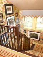 Classic staircase with patterned carpet 