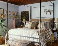 Country bedroom with four poster bed 