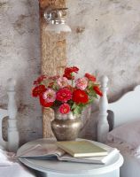 Flowers on country bedside table 