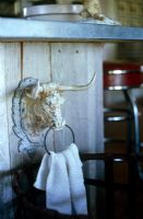 Bull shaped tea towel holder in country kitchen