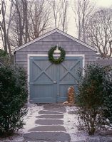 Country outbuilding with Christmas wreath