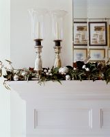 Detail of Christmas decorations on mantelpiece 