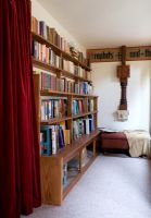Classic bedroom with bookcases