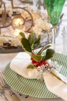 Decorative napkin ring at Christmas table 