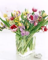 Flower arrangement in glass vase 