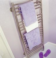 Towel radiator in modern bathroom 