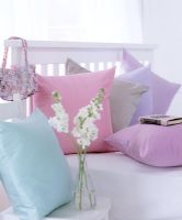Detail of cushions on bed 