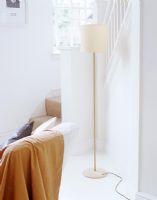 Floor lamp by staircase 