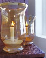 Detail of candles in glass holders 