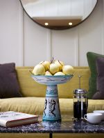 Decorative fruit bowl on coffee table 